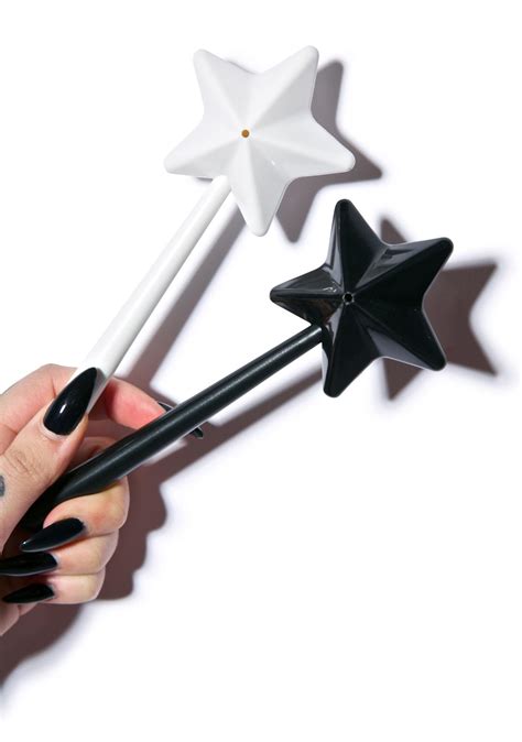 Bring a whimsical touch to your dining experience with magic wand inspired salt and pepper shakers